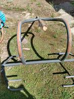 Gras machine heffer, Ophalen