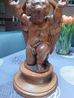 ange en bois, Enlèvement