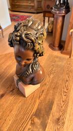 Buste kind, Enlèvement