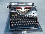 Antieke schrijfmachine met koffer, Ophalen