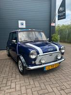 Classic mini 1300 van het bouwjaar 1984, Auto's, Mini, Voorwielaandrijving, Stof, Zwart, 4 cilinders