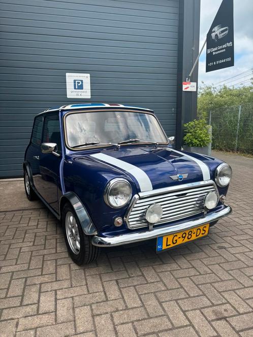 Classic mini 1300 van het bouwjaar 1984, Auto's, Mini, Bedrijf, Benzine, 2 deurs, Handgeschakeld, Blauw, Zwart, Stof, Voorwielaandrijving
