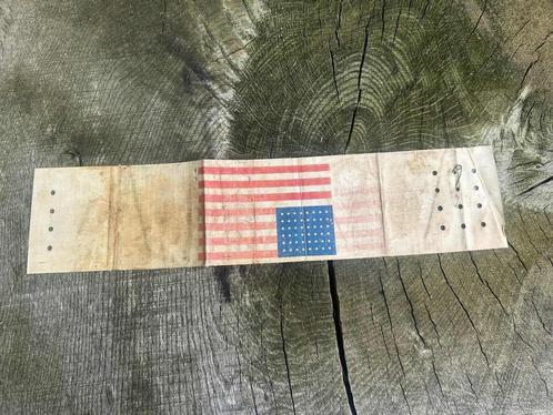 Amerikaanse bevrijdingsarmband uit de Tweede Wereldoorlog, Verzamelen, Militaria | Tweede Wereldoorlog, Overige soorten, Ophalen of Verzenden