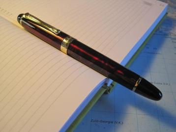 Jinhao X450 (red marblé) beschikbaar voor biedingen