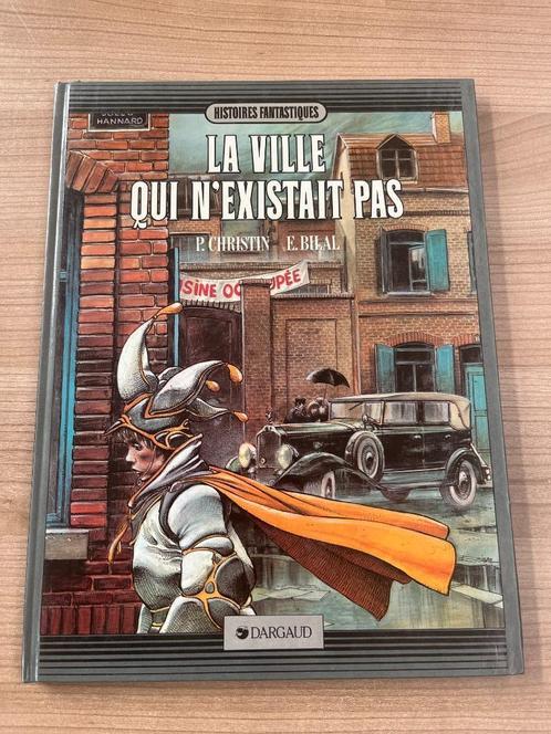 E. BILAL - LA VILLE QUI N'EXISTAIT PAS (EDITION 1987), Boeken, Stripverhalen, Gelezen, Eén stripboek, Ophalen of Verzenden