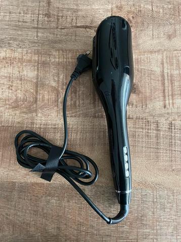 Spin curl borstel beschikbaar voor biedingen