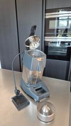 Professionele fruitpers santos, Ophalen