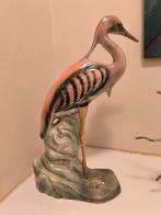 Porselein reiger  Hubert bequet, Ophalen