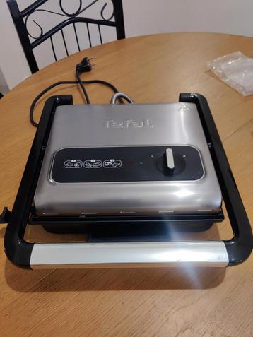 Tefal Panini gril GC242D12 disponible aux enchères