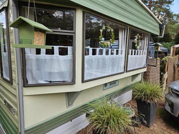 Mobil-home prêt à emménager avec auvent et contenu