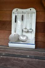 porte-cuillères en émail, Enlèvement