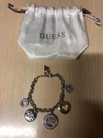 Guess zilverkleurig armband 1 x gedragen met hangertjes als, Handtassen en Accessoires, Armbanden, Ophalen of Verzenden, Zo goed als nieuw