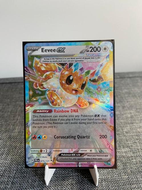 Eevee ex - Prismatic Evolutions, Hobby en Vrije tijd, Verzamelkaartspellen | Pokémon, Zo goed als nieuw, Ophalen of Verzenden