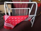 Rotan krantenhouder, Ophalen