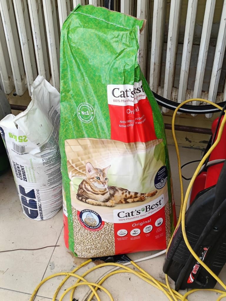 Remplissage du bac à litière, Enlèvement