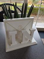 Postbak met planten, Ophalen