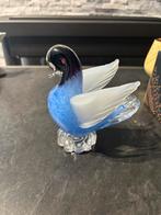 Beeldje zwaan, Ophalen