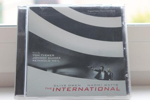 CD SOUNDTRACK THE INTERNATIONAAL / VERZORGD BIBLIOTHEEK-EXEM, Cd's en Dvd's, Cd's | Filmmuziek en Soundtracks, Ophalen of Verzenden