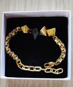 exclusieve armband goud/zwart genderneutraal, Ophalen of Verzenden, Zo goed als nieuw, Goud, Staal