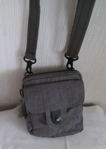 Kipling band. tas man of dame + aap beschikbaar voor biedingen