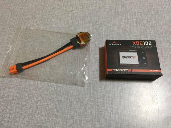 Splinternieuwe Spektrum XBC 100 + Adapter: IC3-batterij/IC5, Hobby en Vrije tijd, Modelbouw | Radiografisch | Overige, Zo goed als nieuw