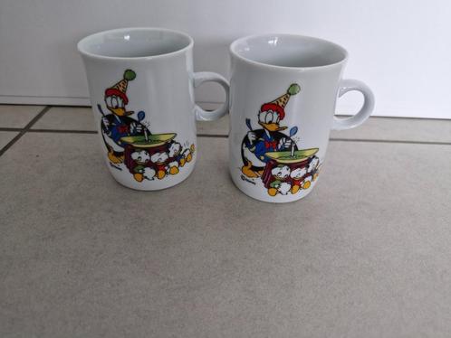 2 mokken Donald Duck €1 per stuk, Verzamelen, Disney, Zo goed als nieuw, Servies, Donald Duck, Ophalen of Verzenden
