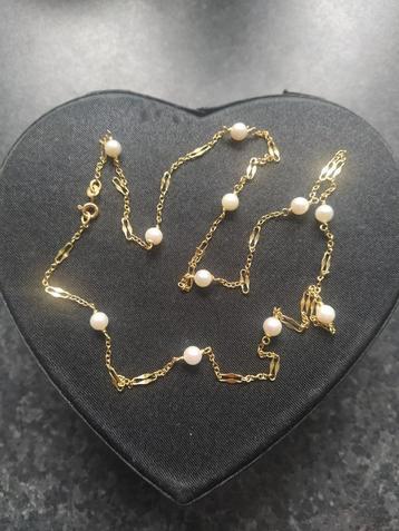 gouden oorbellen 18 K + collier perles fine 18K