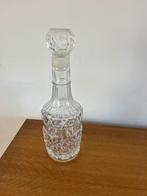 Glazen whiskey fles, Ophalen