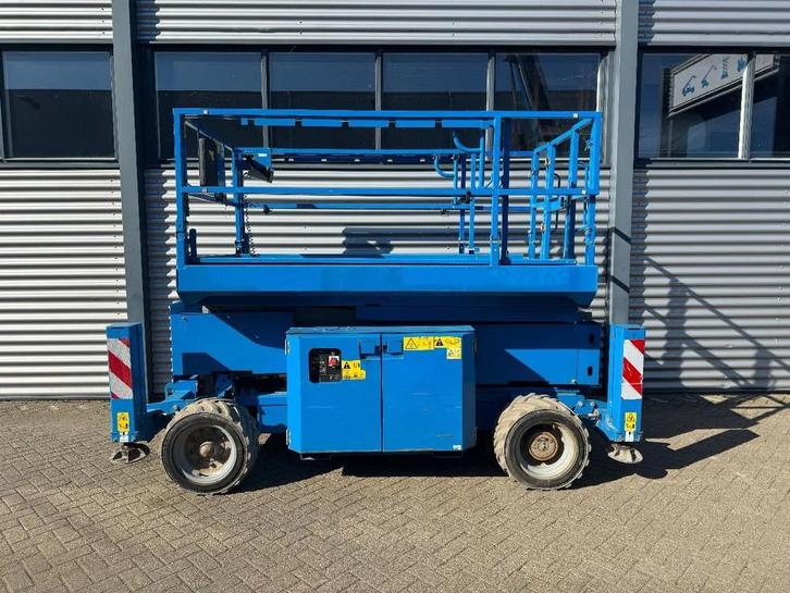 Genie GS2669DC Hoogwerker Schaarhoogwerker (bj 2013), Zakelijke goederen, Machines en Bouw | Liften, Steigers en Ladders