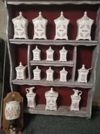 Prachtige ophangkast gevuld met porselein, Ophalen