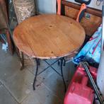 Tafeltje met ijzeren onderstel, Ophalen