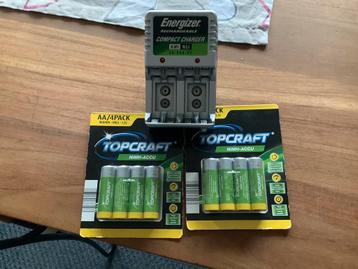 Batterijlader + batterijen beschikbaar voor biedingen