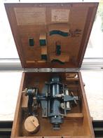 oude landmeter met statief, Ophalen