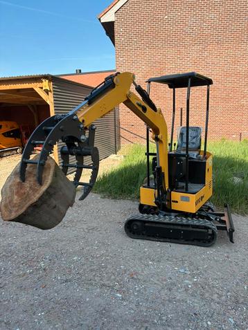 1 ton minigraver kraantje met houtklem - 4 draaiuren  beschikbaar voor biedingen