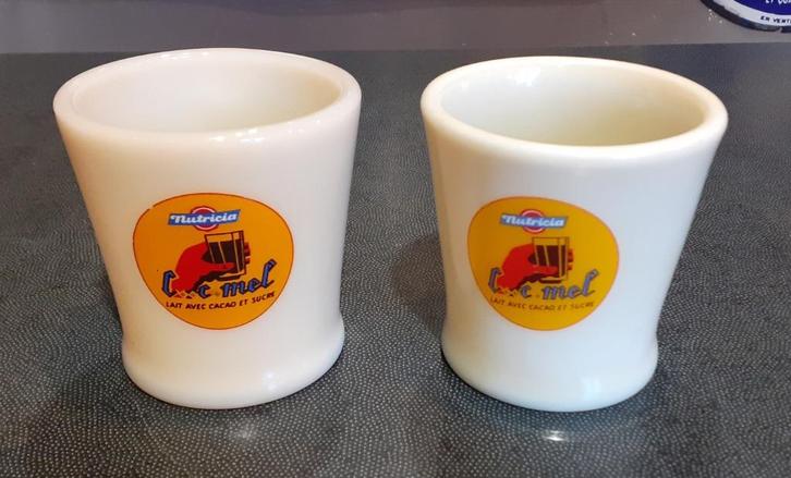Cecemel. Twee Chocomel-bekers C.C.Mel 1949-53, Verzamelen, Merken en Reclamevoorwerpen, Zo goed als nieuw, Gebruiksvoorwerp, Ophalen of Verzenden