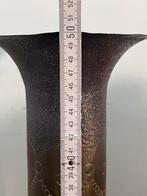 douille d'obus décorée, Enlèvement