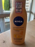 Nivea Q10 + bronze ongeopend, Handtassen en Accessoires, Uiterlijk | Lichaamsverzorging, Ophalen of Verzenden