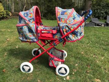 Très joli Landau pour 2 poupées et accessoires bébé beschikbaar voor biedingen