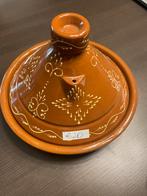 Tajine nieuw, Ophalen