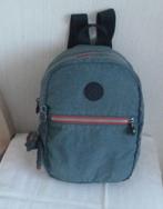 Kipling kleine rugzak in petrol met rode ritssluiting + aap, Gebruikt, Ophalen of Verzenden, Minder dan 25 cm, Waterdicht