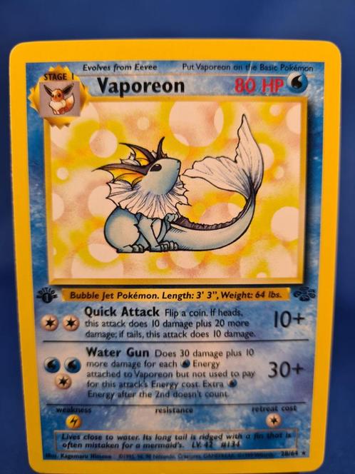 Vaporeon 28/64 - Jungle (1st edition), Hobby en Vrije tijd, Verzamelkaartspellen | Pokémon, Gebruikt, Verzenden
