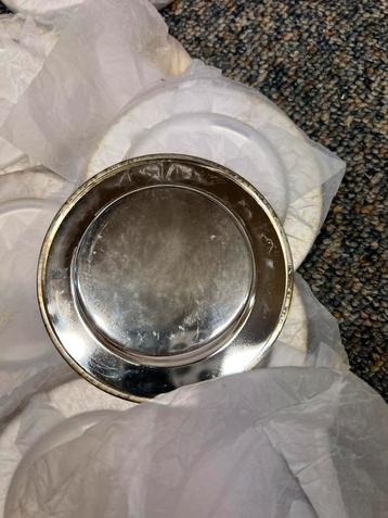 Zilver onderleggers beschikbaar voor biedingen