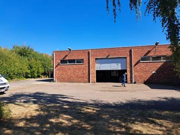 Magazijn met grote parking te huren op Grote Ring Hasselt beschikbaar voor biedingen