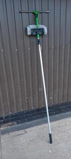 Telescopische borstel en trekker, Ophalen