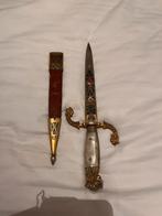 Toledo briefopener / mes, Ophalen