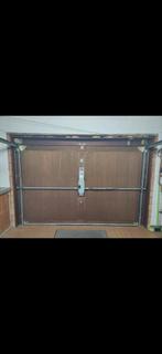 Systeem om houten kantelpoort electrische te maken, Ophalen