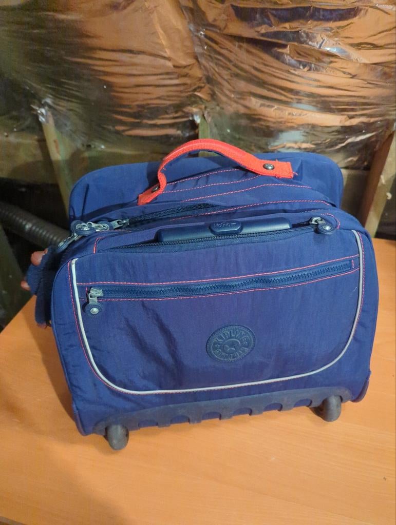 Boekentas Kipling, Ophalen