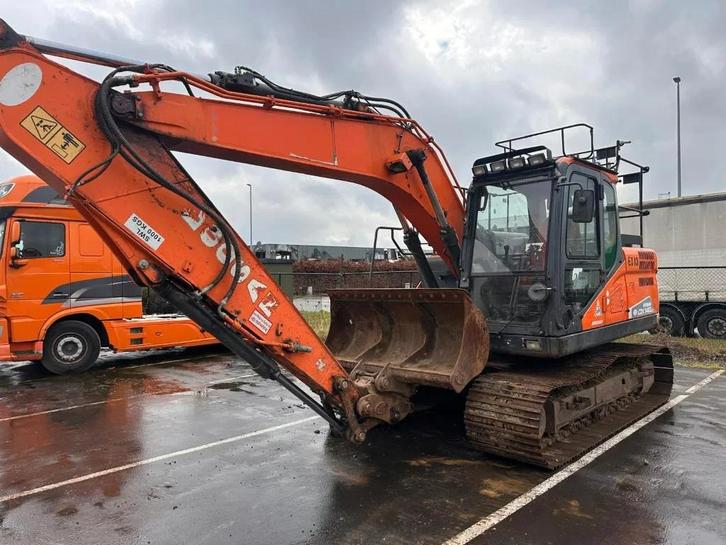 Doosan DX140LC-5 (bj 2016), Zakelijke goederen, Machines en Bouw | Kranen en Graafmachines, Graafmachine