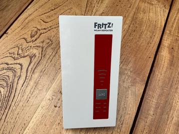 FRITZ!Repeater 1750E voor uitbreiden wifi bereik  liefst oph beschikbaar voor biedingen