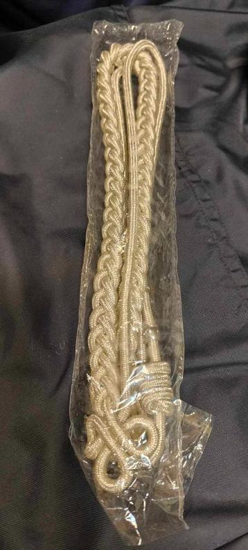 Ancienne aiguillette de Police  neuve beschikbaar voor biedingen
